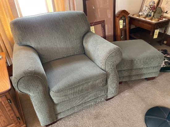 Oversized upholstered arm chair and ottoman