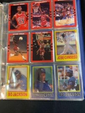 Binder of assorted baseball cards including Randy Johnson, Nolan Ryan, Steve Avery