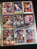 Binder of assorted baseball cards, Roberto Alomar, Sandy Alomar Jr., Andre Dawson, Eric Davis