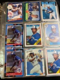 Binder of assorted baseball cards, Cecil Fielder, Carlton Fisk, Julio Franco, Ricky Henderson