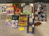 Assorted sports items, mini football, Pinnacle cans, framed photo, pins and more