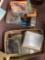 Two flats of pictures on glass, old stamp books, small collectibles