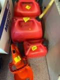 Gas cans and hedge trimmers