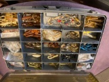 Tackle box with fishing tackle