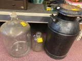 2 large glass jugs and milk can