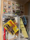 Three containers of fishing lures and tackle