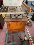 Craftsman tablesaw with wooden cabinet, cart is not included