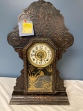 Carved wooden mantle clock