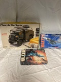 Three model kits- Chevy gun tractor and two jets