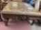 Large granite top table with wood base 42 inches by 42 inches