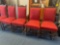5 very nice wood carved chairs with reupholstered red material
