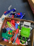 1 box miscellaneous toys, cars, trucks etc