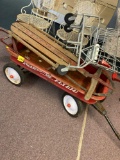 Radio Flyer wagon, Melissa and Doug kid shopping cart and vintage sled