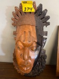 Wood carved mask wall hanging