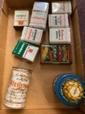 Old advertising tins and spices and thermos and ceramic figures