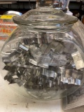 2 glass jars with lids and cookie cutters