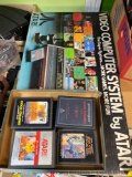 Atari system in original box, and games
