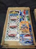 Box lot of blister pack cars racing champions and Hot Wheels, Matchbox
