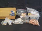 Box of assorted playset figures, Smurfs, animals, cowboys and Indians