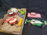 Race cars one Pez, pink Cadillac, rc van, assorted cars