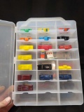 Assorted plastic and metal cars with case