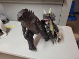 Godzilla toy missing hand and Toys 'r Us dragon