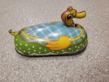 Tin windup duck toy