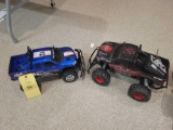 Pair of RC trucks, one remote