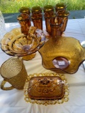 Amber glassware, (9) sundae glasses, bowls, pitcher, covered dish.