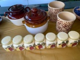(2) Bean pots, set of (7) fruit decorated jars, (2) Ransbottom crocks.