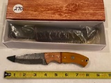 Unmarked knife w/ leather sheath, MIB.