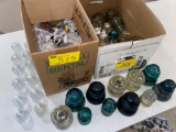 (2) Boxes full of glass insulators.