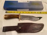 Knife w/ leather sheath button marked 