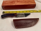 Pakistan knife w/ leather sheath.