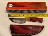 Unmarked knife w/ leather sheath. MIB.