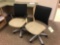 Pair of office desk chairs, one with arm rest