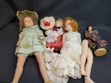 4 dolls, one with legs detached
