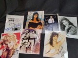 Group of autographed celebrity photos