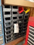30 black organizer bins full of nuts and bolts