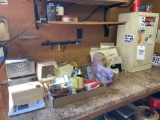 White cabinet, contents on counter, time clock, misc.