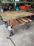 Metal base table on wheels