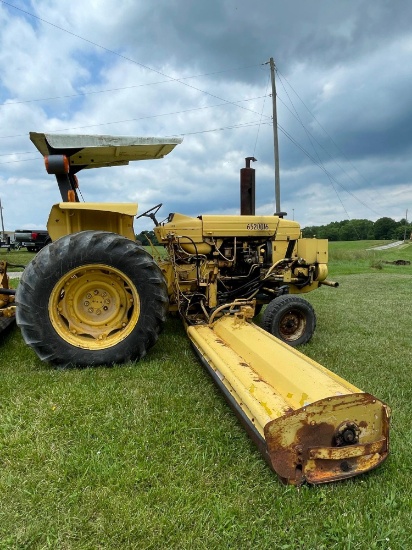 Ford tractor w/ 2 fold down flail side mowers
