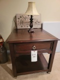Side Table with Lamp and Sign