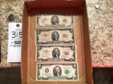 3 red seal bills and 2dollar bill