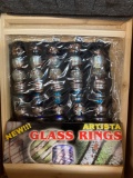 Boxes of new artista glass rings
