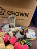 Box full of miscellaneous new items, flashlights, lights, travel mugs, hats, jewelry