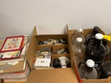 3 boxes vintage Christmas paper items, gallon jug bottles, electric parts