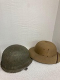 2 helmets- pith helmet and odd US style WWII 3 strap attachments no liner