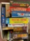 Box of board games and puzzles all in new sealed condition