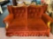 nice brick red color sofa/loveseat